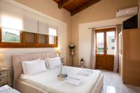 Posteľ alebo postele v izbe v ubytovaní Golden Sand Beach Villa