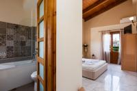 Posteľ alebo postele v izbe v ubytovaní Golden Sand Beach Villa