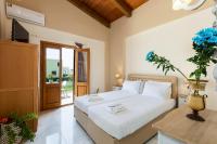 Posteľ alebo postele v izbe v ubytovaní Golden Sand Beach Villa