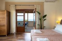 Posteľ alebo postele v izbe v ubytovaní Golden Sand Beach Villa