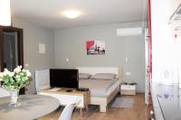 Posteľ alebo postele v izbe v ubytovaní Apartmani Žužić