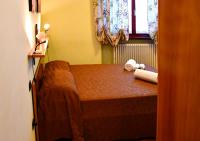 Posteľ alebo postele v izbe v ubytovaní Bed And Breakfast Il Riccio
