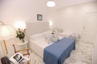 Posteľ alebo postele v izbe v ubytovaní La Kenzia Casa Vacanze