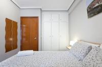 Posteľ alebo postele v izbe v ubytovaní City Beach Living