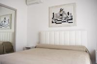 Posteľ alebo postele v izbe v ubytovaní Home Suites Home