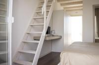 Posteľ alebo postele v izbe v ubytovaní Home Suites Home