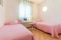 Postel nebo postele na pokoji v ubytování Robertapartments