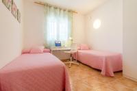 Postel nebo postele na pokoji v ubytování Robertapartments