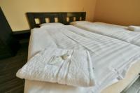 Postel nebo postele na pokoji v ubytování Wellness Hotel Fridrich