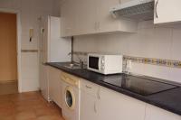 A kitchen or kitchenette at Renovado y muy cerca del centro urbano