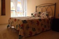 A bed or beds in a room at Renovado y muy cerca del centro urbano