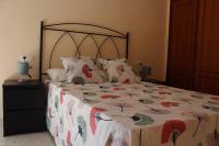 A bed or beds in a room at Renovado y muy cerca del centro urbano