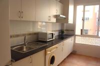 A kitchen or kitchenette at Renovado y muy cerca del centro urbano