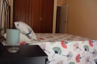 A bed or beds in a room at Renovado y muy cerca del centro urbano