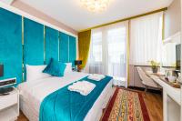 Postel nebo postele na pokoji v ubytování Eastanbul Suites