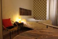 A bed or beds in a room at Albergo delle Spezie