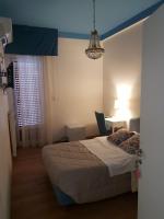 A bed or beds in a room at La Dimora del Conte