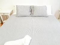 Posteľ alebo postele v izbe v ubytovaní Pension Aussie Guesthouse