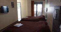 Posteľ alebo postele v izbe v ubytovaní Villa Georgia beach