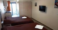 Posteľ alebo postele v izbe v ubytovaní Villa Georgia beach