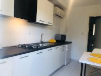 Kuchyň nebo kuchyňský kout v ubytování Apartman Nekic