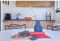 Kuchyň nebo kuchyňský kout v ubytování Apartament Berg