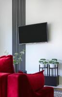 TV a/nebo společenská místnost v ubytování Apartament Berg