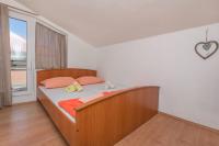 Posteľ alebo postele v izbe v ubytovaní Apartment Mandic