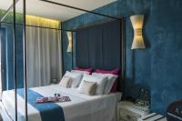 Postel nebo postele na pokoji v ubytování Hotel Villa Ducale