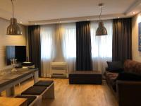 Posezení v ubytování Luxury Apartments In Top City Center Varna 2