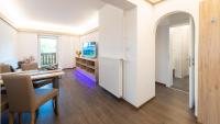 Televízia a/alebo spoločenská miestnosť v ubytovaní Apartments Presslauer - Mori