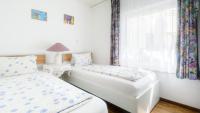Posteľ alebo postele v izbe v ubytovaní Apartments Presslauer - Mori