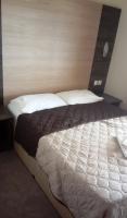 Posteľ alebo postele v izbe v ubytovaní Villa Georgia beach