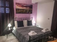A bed or beds in a room at B&B Villa Sophie