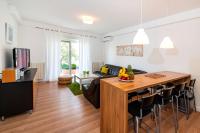 Telewizja i/lub zestaw kina domowego w obiekcie Apartment 1001 Nights