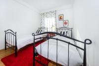 Łóżko lub łóżka w pokoju w obiekcie Apartment 1001 Nights