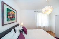Łóżko lub łóżka w pokoju w obiekcie Apartment 1001 Nights