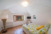 A bed or beds in a room at Villa Eos