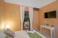 A television and/or entertainment centre at Villa Eos