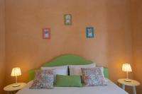 A bed or beds in a room at Villa Eos
