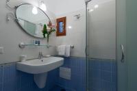 A bathroom at Villa Eos