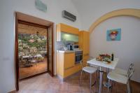 A kitchen or kitchenette at Villa Eos