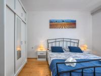 Łóżko lub łóżka w pokoju w obiekcie Apartments Folo