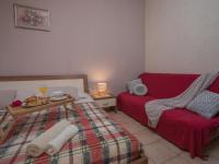 Łóżko lub łóżka w pokoju w obiekcie Apartments Folo