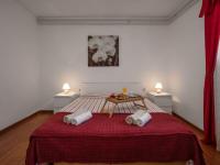 Łóżko lub łóżka w pokoju w obiekcie Apartments Folo