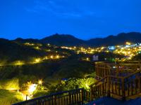 a view of a city at night at Formosa Arcadian Villa in Jiufen