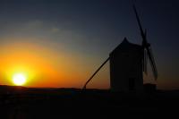The sunrise or sunset as seen from a vendégházakat or nearby