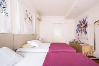 The Jasmine Terrace Retreatにあるベッド
