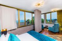 Postel nebo postele na pokoji v ubytování Eastanbul Suites