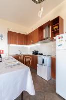 Kuchyňa alebo kuchynka v ubytovaní Naiada Stomio-A apartment